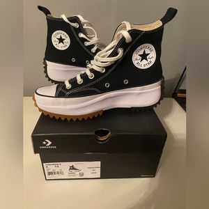 Canvas high top platform Converse sneakers.